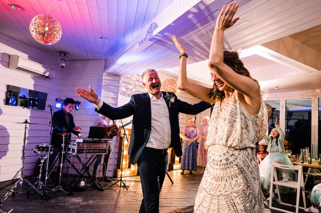 Fun and informal first dance at a Tunnels Beaches wedding