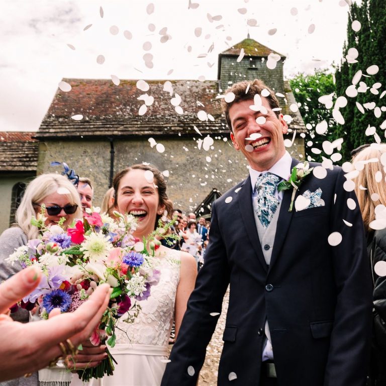 Confetti after Sussex church ceremony before Pangdean Old Barn wedding