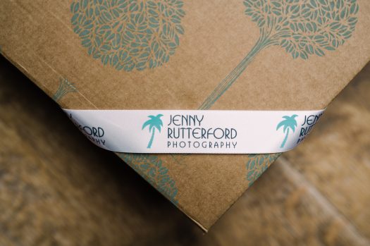 Wedding Album tied with logo ribbon by Jenny Rutterford Photography