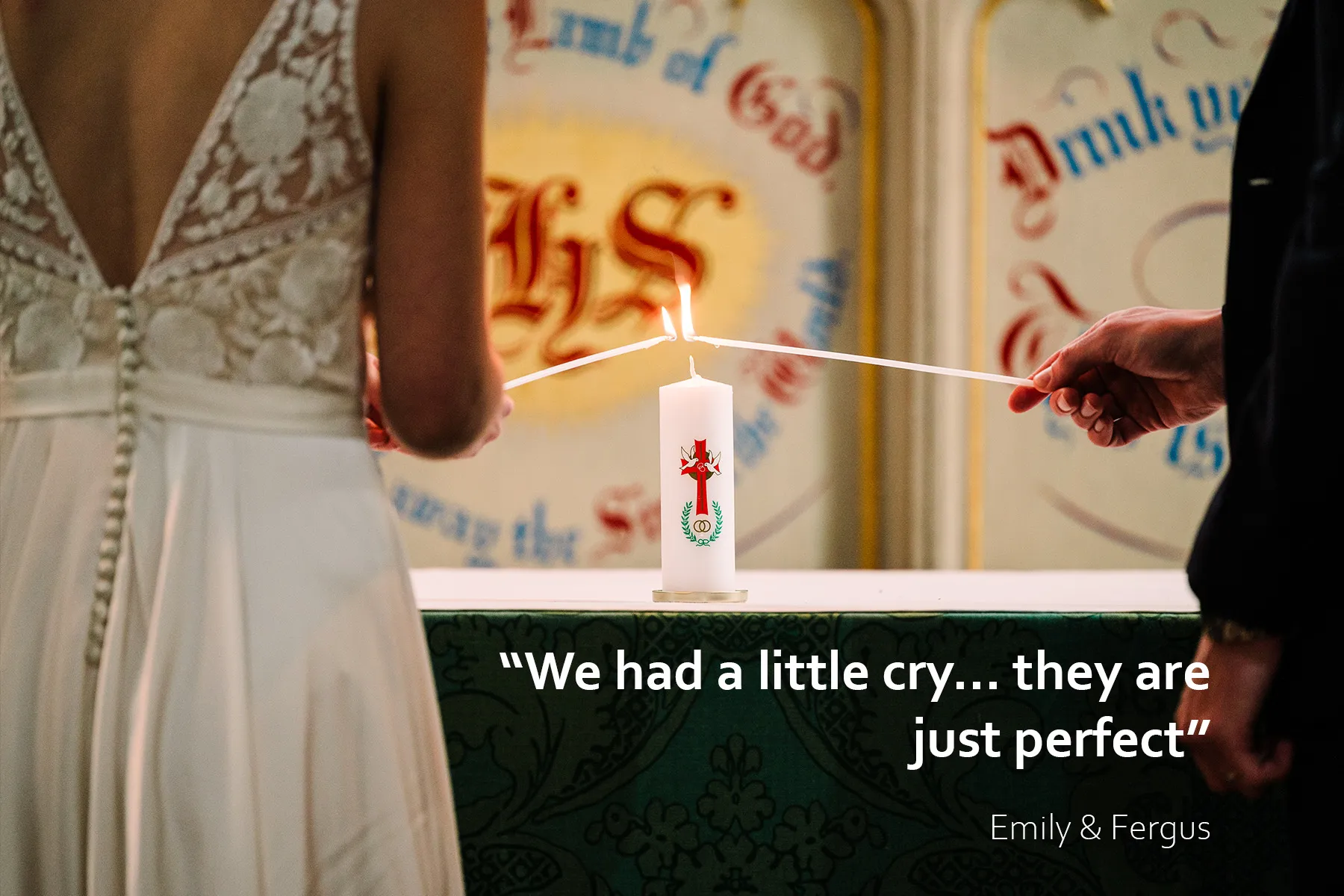 Bride and groom jointly light a candle during their wedding ceremony at a Sussex church