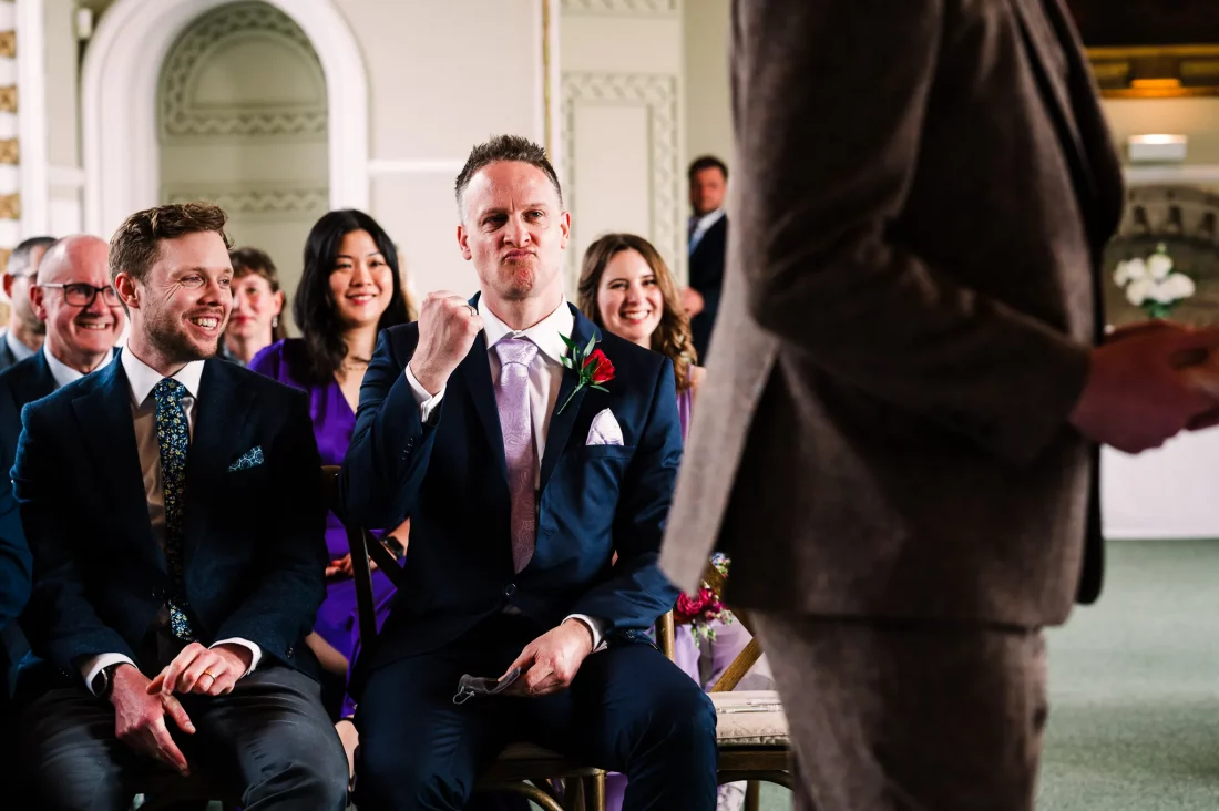 Best Man does a fist pump at Arundel Town Hall wedding
